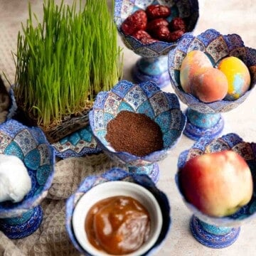 Norouz(波斯新年)的传统haft-sin表的完整指南，包括7个基本项目，常见的附加项目，和波斯甜点。bob电子体育竞猜| aheadofthyme.com